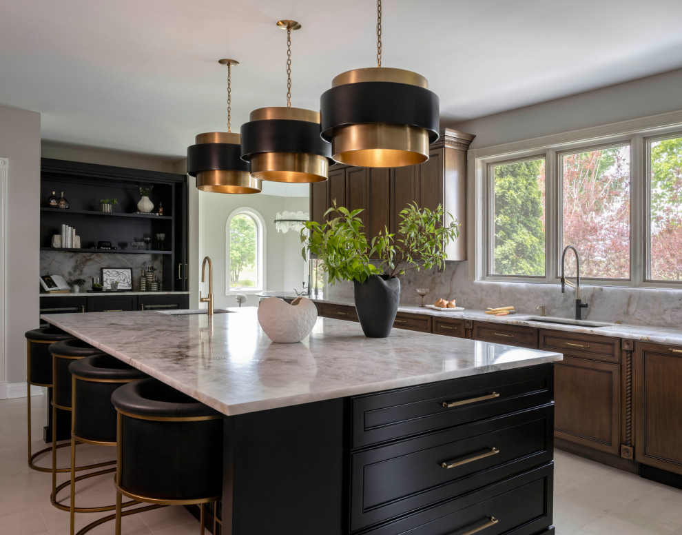 Inspiration for a large transitional l-shaped porcelain tile and beige floor eat-in kitchen remodel in Chicago with an undermount sink, medium tone wood cabinets, quartzite countertops, an island, recessed-panel cabinets, gray backsplash, stone slab backsplash, paneled appliances and gray countertops