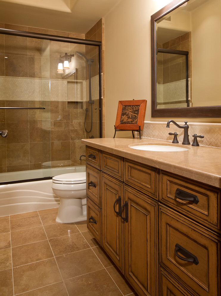Example of a mountain style home design design in Phoenix