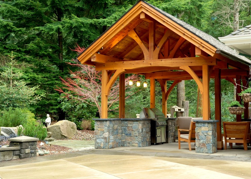 Inspiration for a traditional patio in Seattle with an outdoor kitchen.