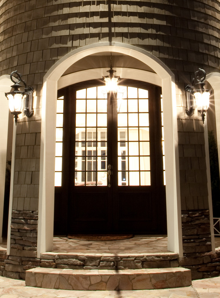 Photo of a large traditional front door in Gold Coast - Tweed with slate floors, a double front door and a dark wood front door.