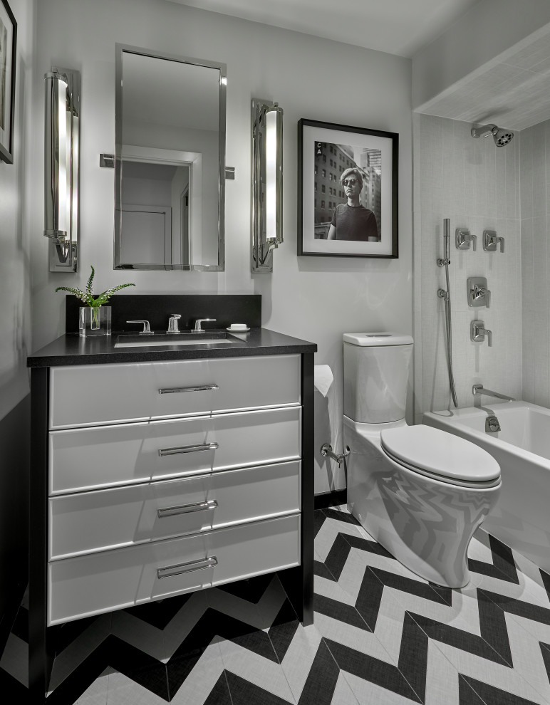 Inspiration för mellanstora moderna svart badrum med dusch, med svarta skåp, en toalettstol med hel cisternkåpa, vita väggar, dusch med duschdraperi, möbel-liknande, ett platsbyggt badkar, en dusch/badkar-kombination, grå kakel, kalkstensgolv, ett avlångt handfat, granitbänkskiva och flerfärgat golv
