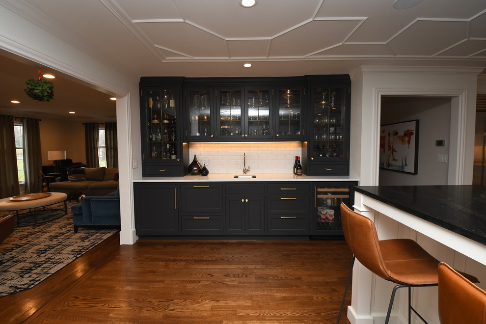 This is an example of a modern home bar in Cleveland.
