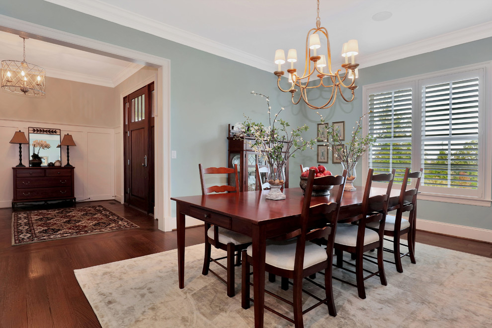 Inspiration for a mid-sized arts and crafts separate dining room in Richmond with blue walls and dark hardwood floors.