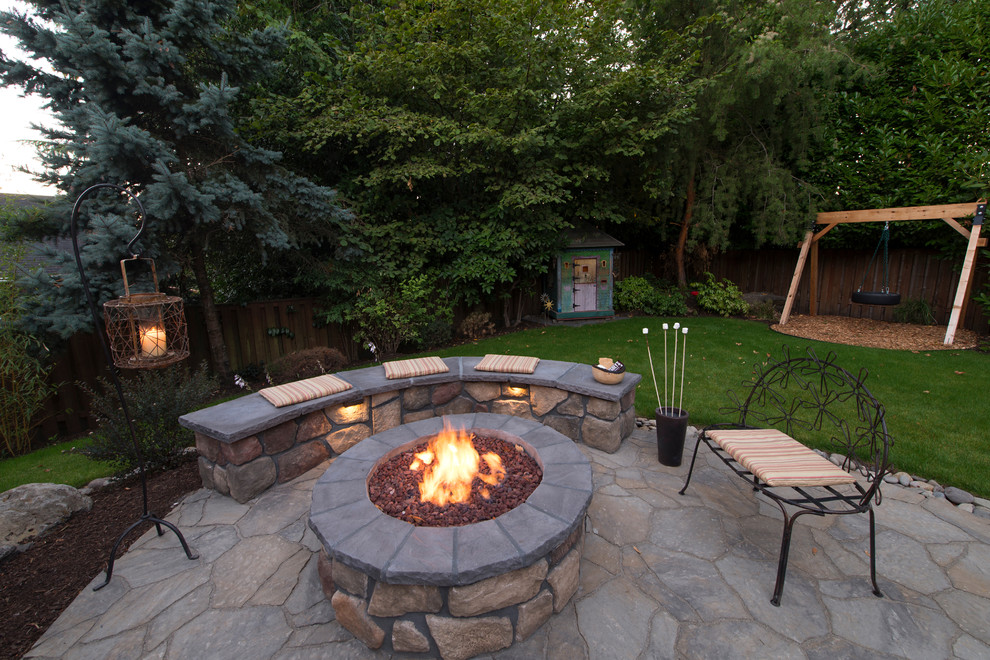 Design ideas for a traditional patio in Portland with a fire feature and no cover.