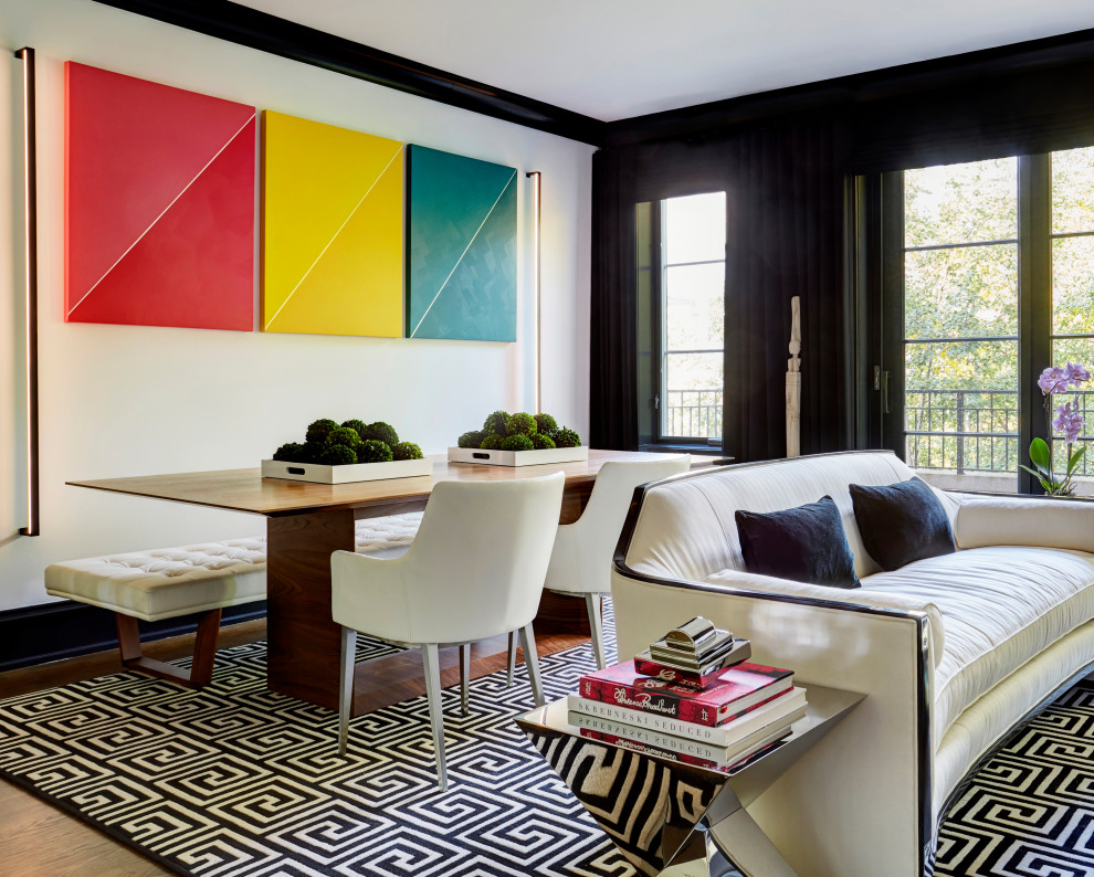 Trendy medium tone wood floor and brown floor dining room photo in Chicago with white walls