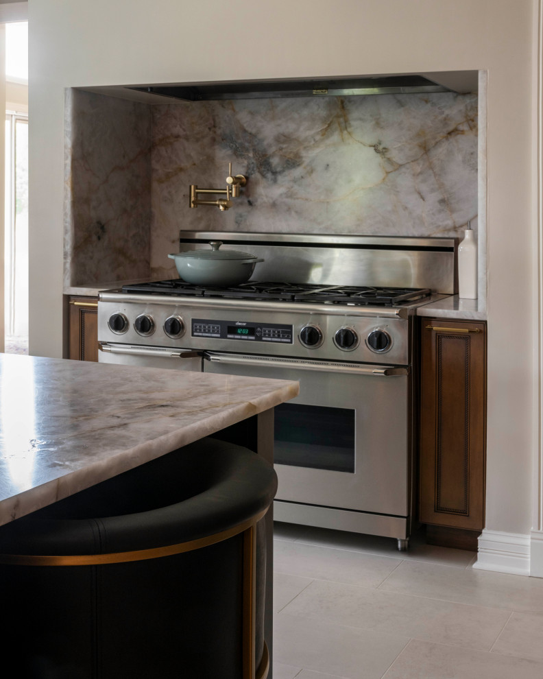 Example of a large transitional porcelain tile and beige floor eat-in kitchen design in Chicago with an undermount sink, medium tone wood cabinets, quartzite countertops, an island and multicolored countertops
