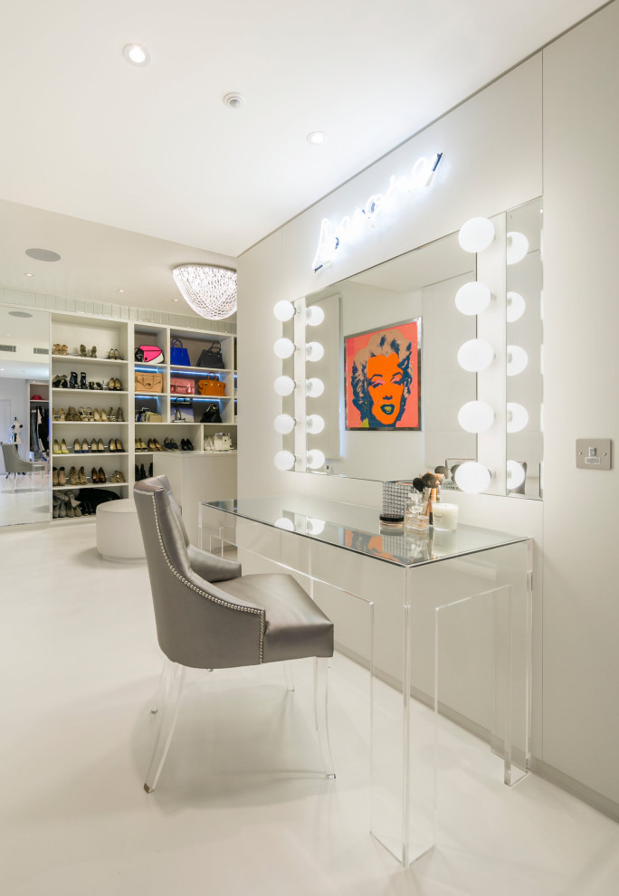 Photo of a large contemporary women's dressing room in London with porcelain floors and white floor.