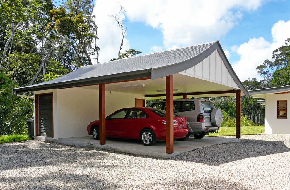 Photo of a mid-sized tropical detached two-car carport in Brisbane.