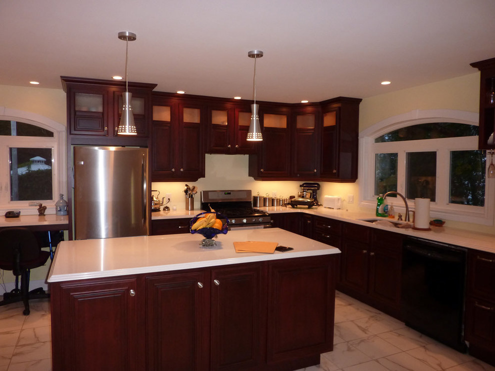 Inspiration for a mid-sized transitional l-shaped ceramic tile and beige floor open concept kitchen remodel with an undermount sink, raised-panel cabinets, dark wood cabinets, quartz countertops, stainless steel appliances, an island and beige countertops
