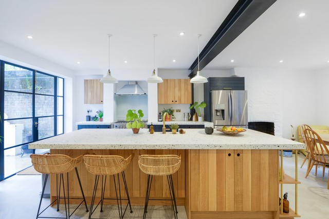 An Unusual Countertop Is At The Center Of This Bright Kitchen