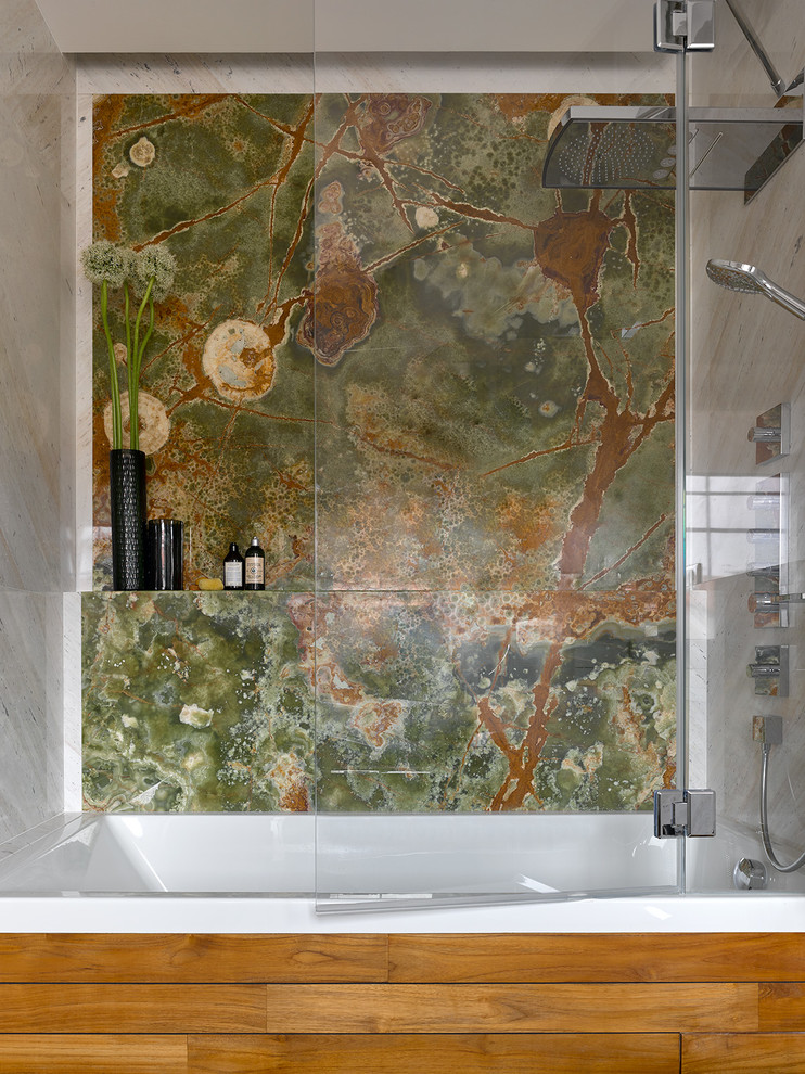 Photo of a mid-sized contemporary bathroom in Moscow with marble, a hinged shower door, green tile, multi-coloured tile, an alcove tub and a shower/bathtub combo.