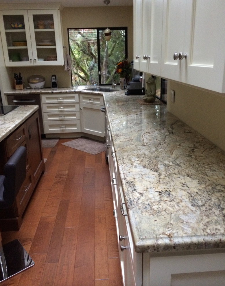 Inspiration for a large contemporary eat-in kitchen remodel in San Francisco with shaker cabinets and an island
