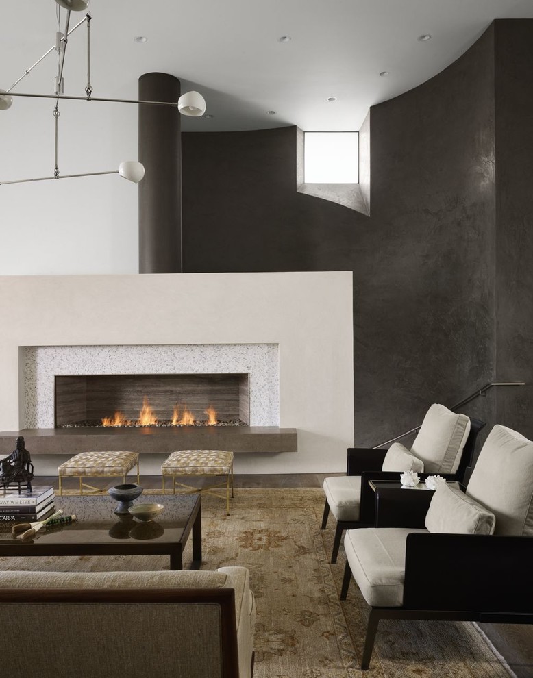 Contemporary living room in Austin with black walls, a ribbon fireplace and no tv.