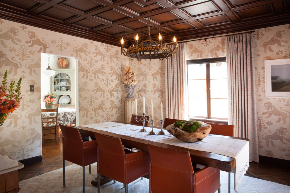 This is an example of a mid-sized mediterranean separate dining room in San Francisco with white walls, brown floor and dark hardwood floors.