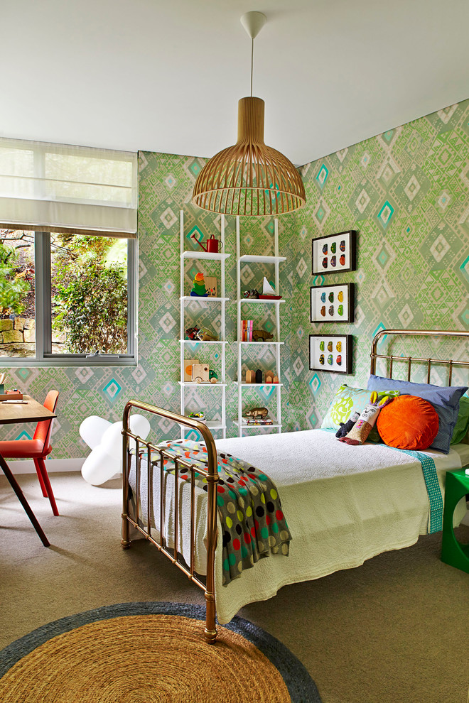 Photo of a mid-sized contemporary kids' bedroom for kids 4-10 years old and girls in Sydney with carpet and green walls.