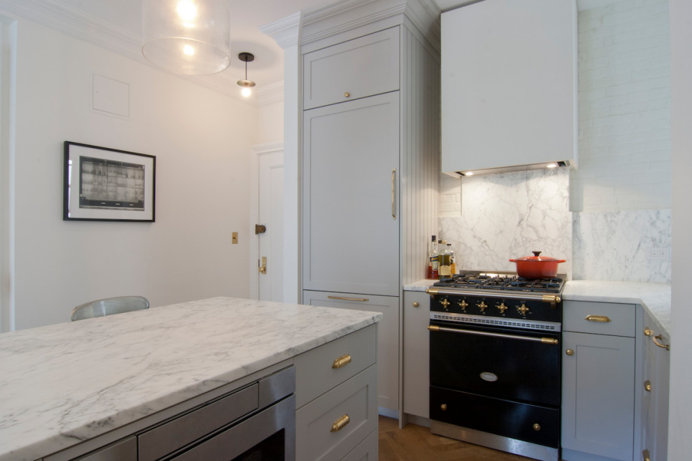 Example of a transitional kitchen design in New York