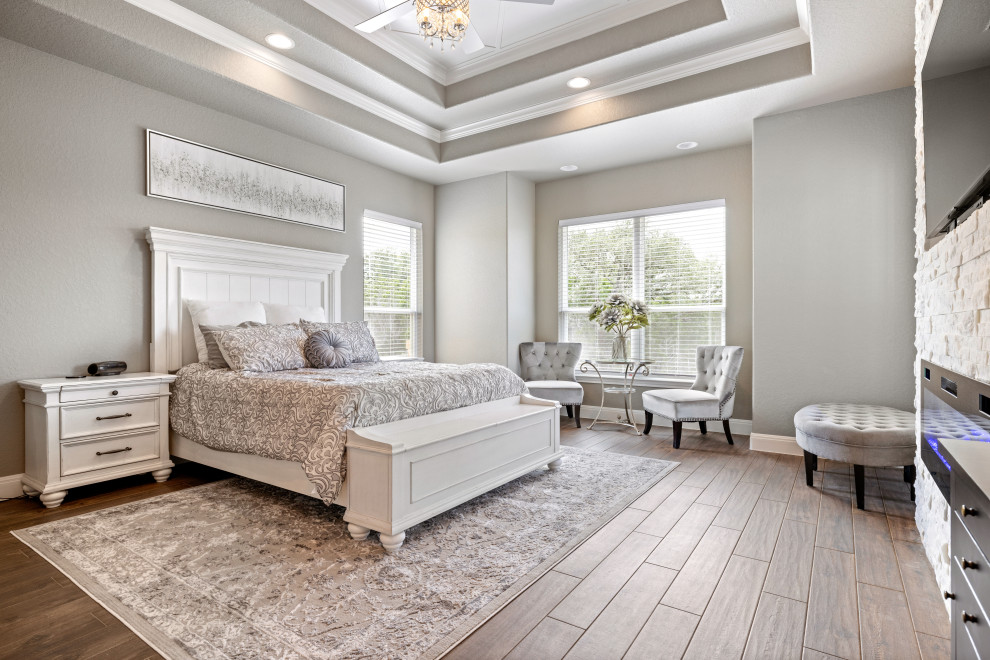 Transitional bedroom photo in Austin
