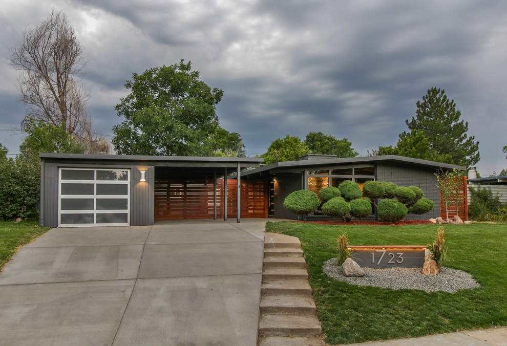 This is an example of a large midcentury exterior in Denver.