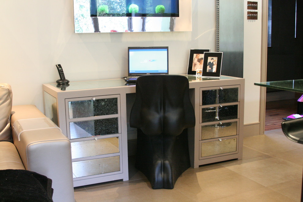 Photo of a small contemporary study room in Hertfordshire with white walls, porcelain floors and a freestanding desk.