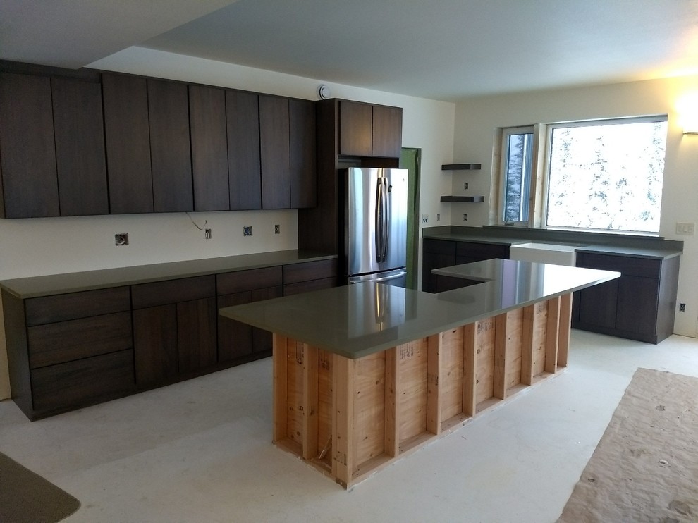 This is an example of a mid-sized contemporary u-shaped open plan kitchen in Other with an undermount sink, flat-panel cabinets, grey cabinets, ceramic splashback, stainless steel appliances, with island and green benchtop.