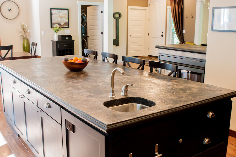 Inspiration for a mid-sized transitional l-shaped dark wood floor and brown floor eat-in kitchen remodel in San Diego with an undermount sink, shaker cabinets, dark wood cabinets, marble countertops, beige backsplash, ceramic backsplash, stainless steel appliances, an island and brown countertops