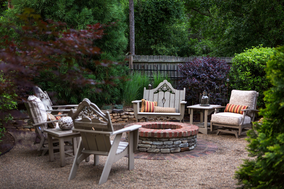 Design ideas for a traditional patio in Charlotte with a fire feature and no cover.