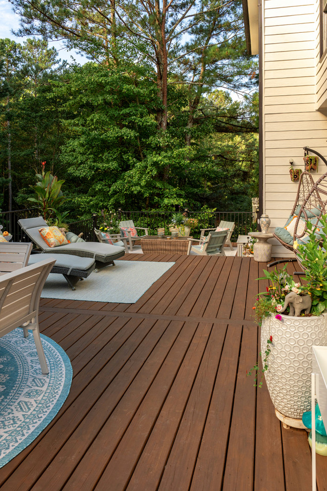 Inspiration for a transitional backyard second story metal railing deck remodel in Atlanta with a bbq area and no cover