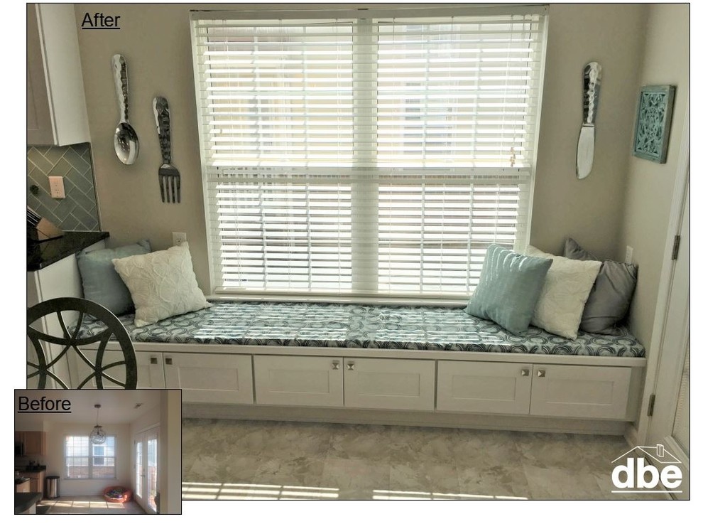 Example of a mid-sized transitional u-shaped vinyl floor and brown floor eat-in kitchen design with an undermount sink, shaker cabinets, white cabinets, glass countertops, blue backsplash, glass tile backsplash, stainless steel appliances and an island