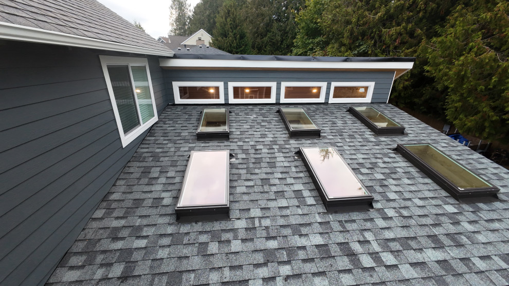 Home design - large craftsman home design idea in Seattle
