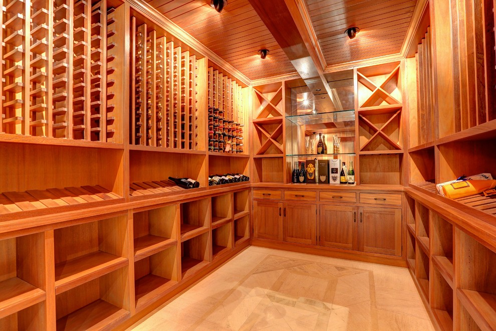 Inspiration for an expansive traditional wine cellar in San Francisco with marble floors and display racks.