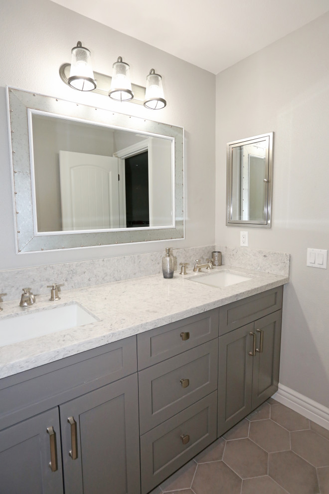 This is an example of a mid-sized modern bathroom in Orange County with beaded inset cabinets, grey cabinets, grey walls, slate floors, a drop-in sink, quartzite benchtops, multi-coloured floor, multi-coloured benchtops, an enclosed toilet, a double vanity and a built-in vanity.