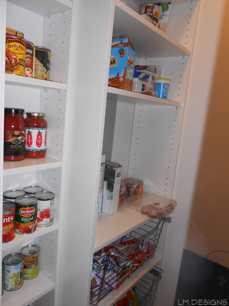 Inspiration for a transitional galley kitchen pantry remodel with white cabinets