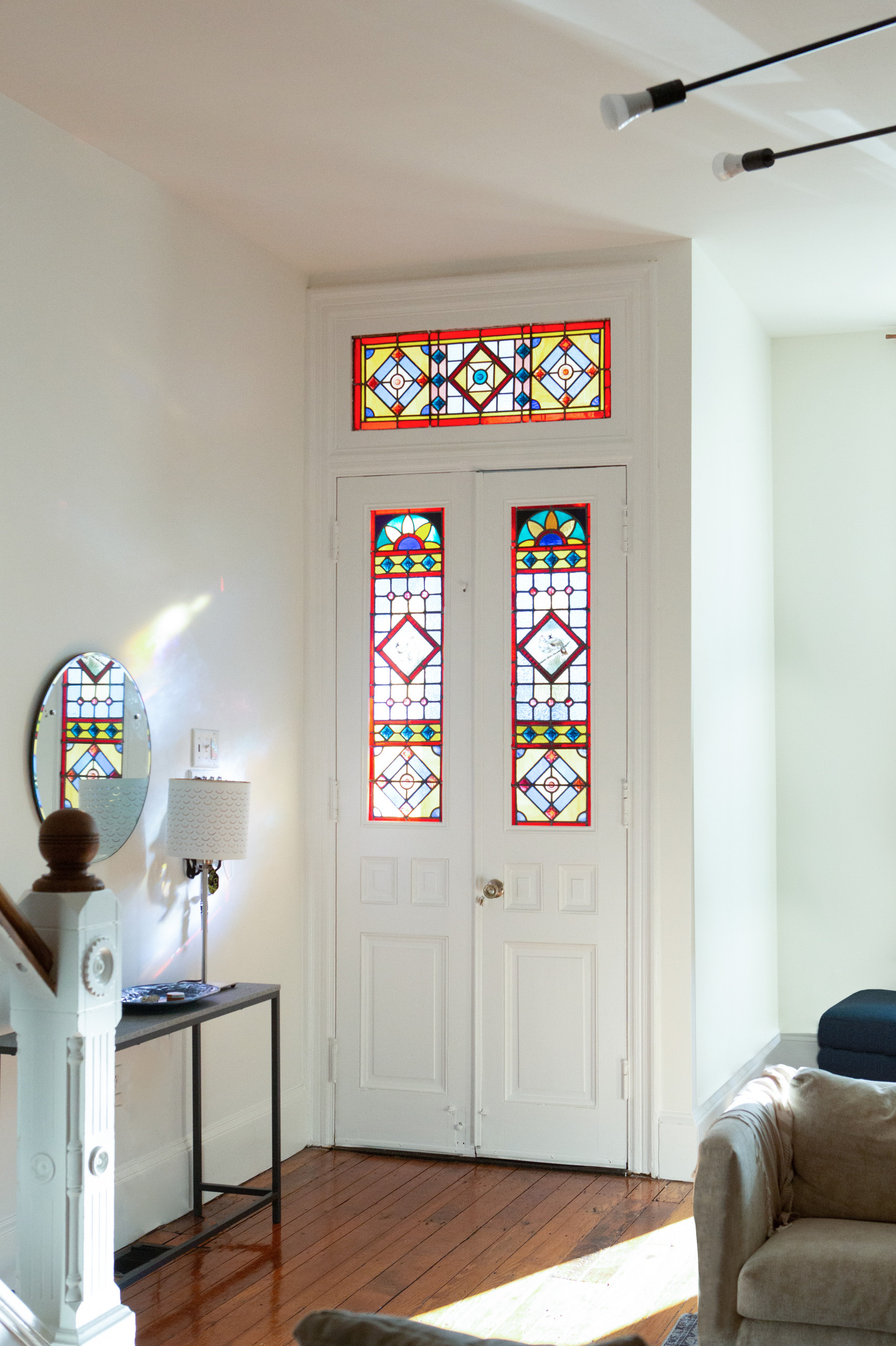 Stained glass foyer door after fresh paint job