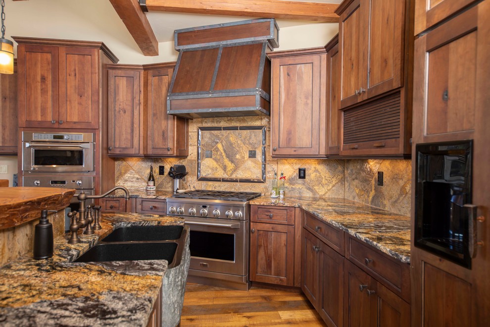 Mountain style kitchen photo in Denver