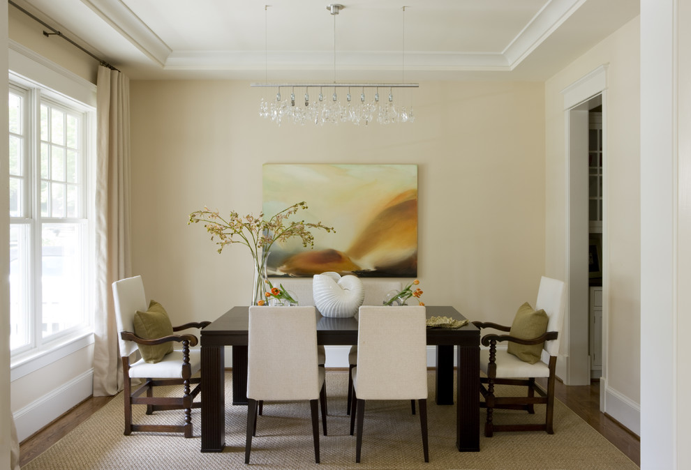 Design ideas for a contemporary separate dining room in DC Metro with beige walls and dark hardwood floors.