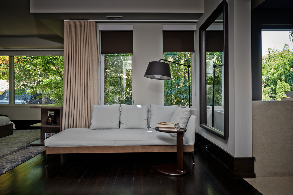 Photo of a mid-sized contemporary master bedroom in Toronto with white walls, dark hardwood floors and no fireplace.
