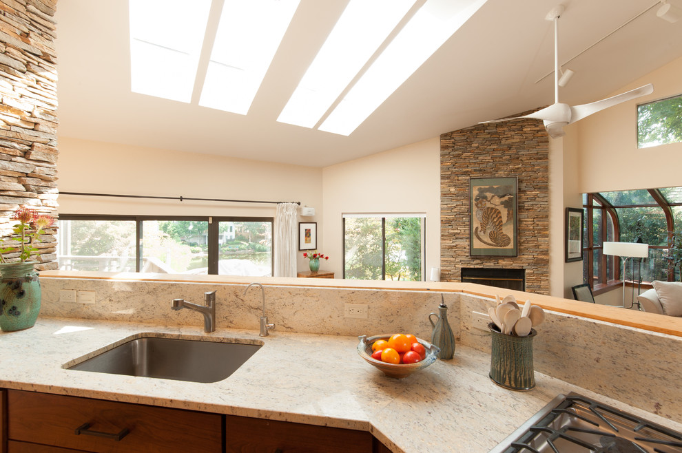 Large transitional kitchen photo in DC Metro with an undermount sink, shaker cabinets, granite countertops, stainless steel appliances and an island
