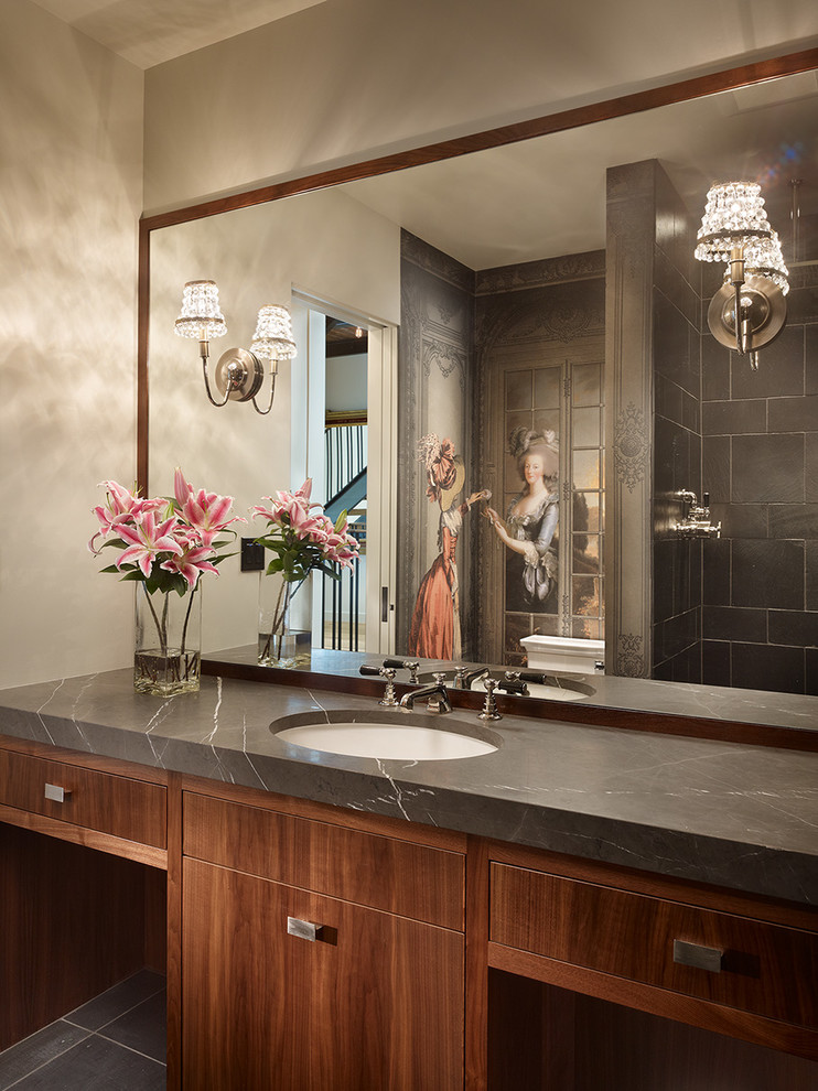 Photo of a contemporary bathroom in Seattle with an undermount sink, flat-panel cabinets, dark wood cabinets, an alcove shower, gray tile and grey benchtops.