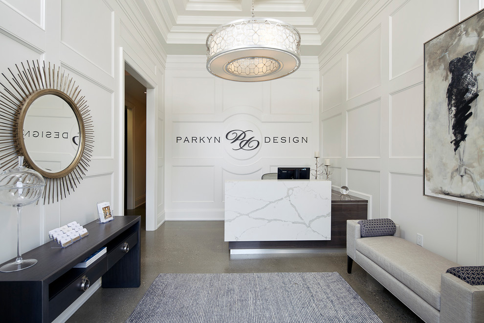 Foyer - large transitional concrete floor foyer idea in Toronto with white walls