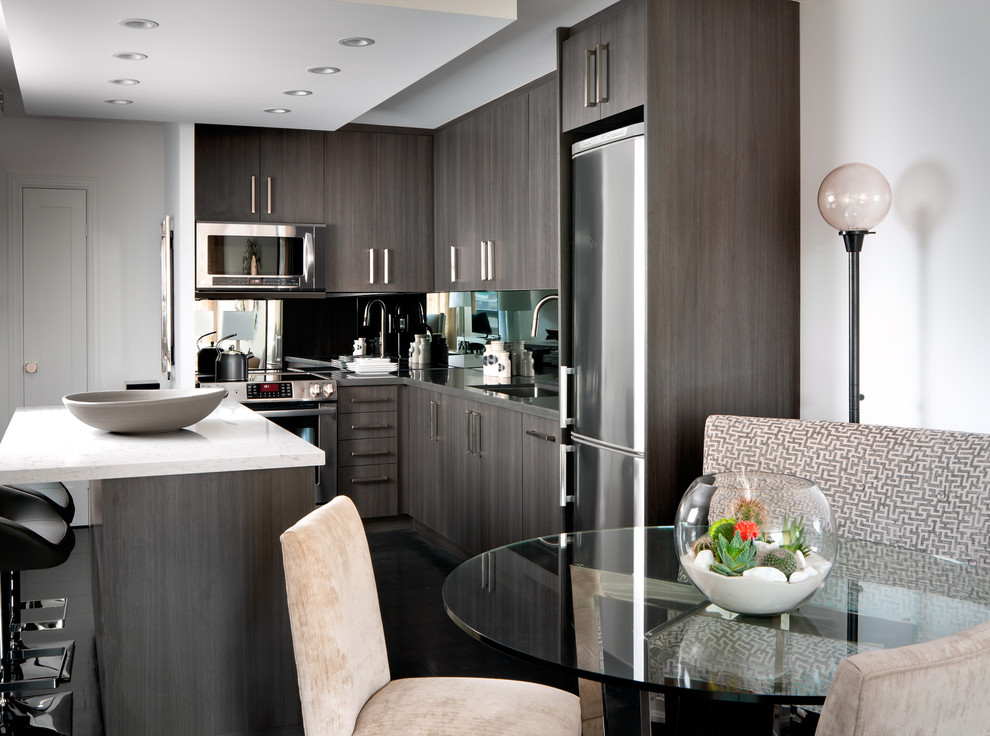 Design ideas for a contemporary eat-in kitchen in Toronto with stainless steel appliances.