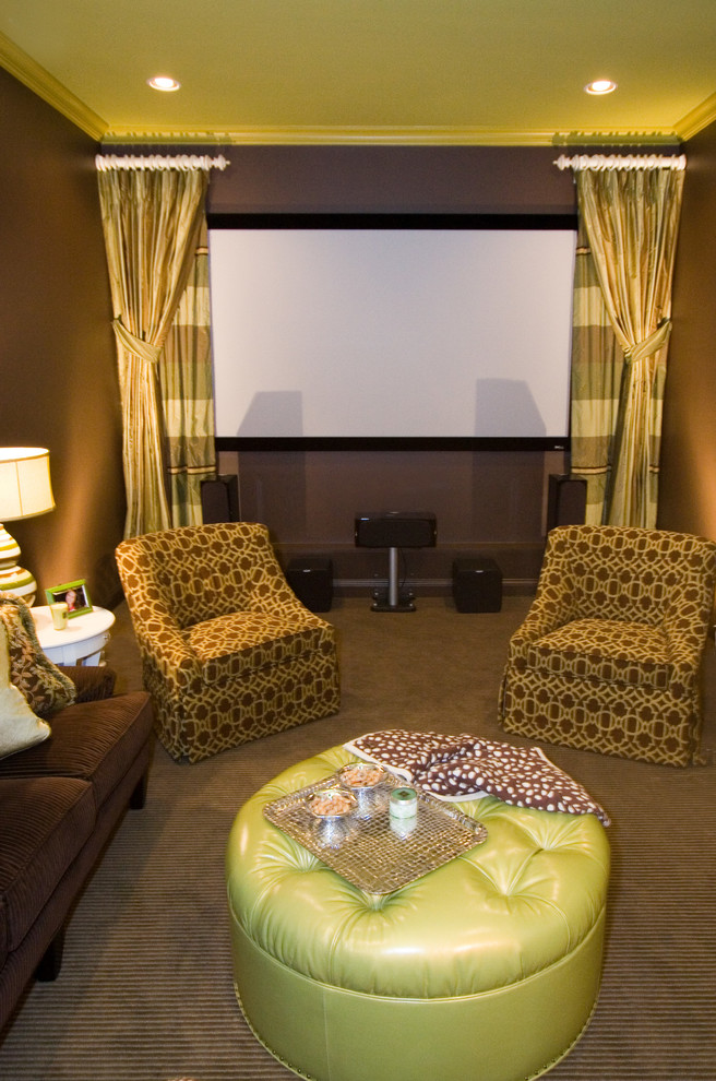 Transitional home theatre in Nashville with brown walls, carpet and a projector screen.