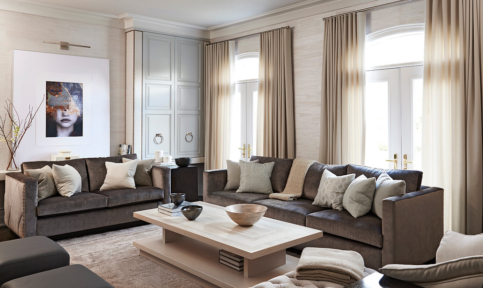 This is an example of a mid-sized transitional formal living room in Toronto with beige walls.