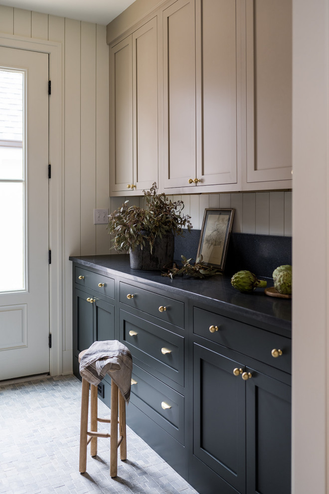 Small transitional gray floor and shiplap wall entryway photo in Indianapolis with white walls and a white front door