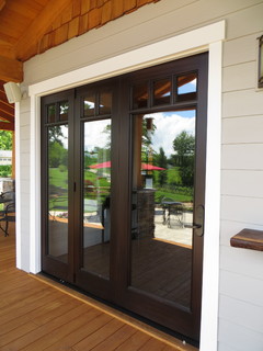 Bi-folding Patio door and Arts & Crafts eclectic Entry Door