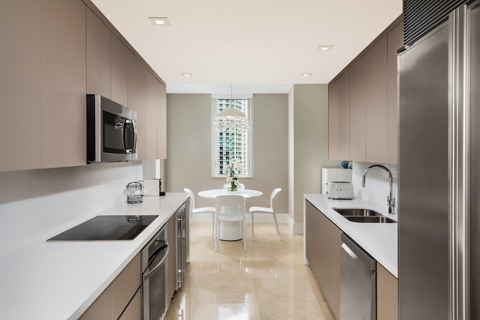Design ideas for a small contemporary kitchen in Miami with flat-panel cabinets, brown cabinets, quartzite benchtops, white splashback, engineered quartz splashback, marble floors, no island, beige floor and white benchtop.
