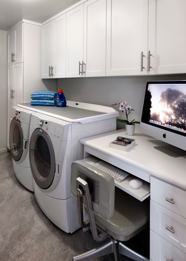 This is an example of a beach style laundry room in Santa Barbara.