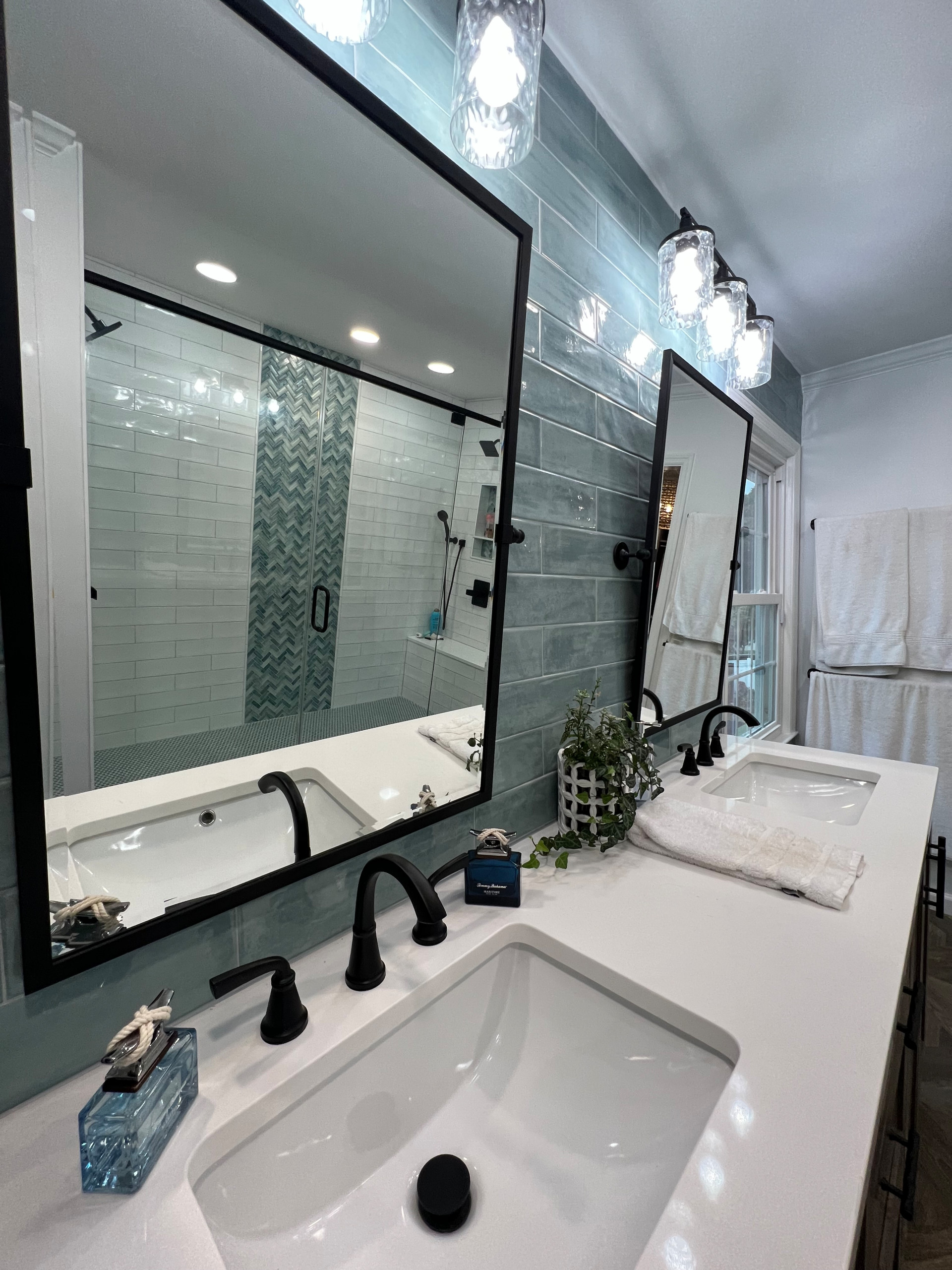 Walk in shower with custom stained vanity