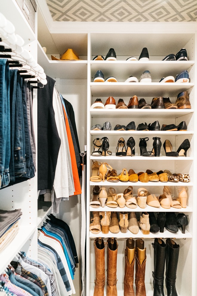 Inspiration for a mid-sized transitional gender-neutral walk-in wardrobe in San Francisco with shaker cabinets, white cabinets, medium hardwood floors, brown floor and wallpaper.