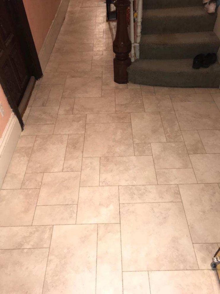 Inspiration for a vinyl floor entryway remodel in Boston