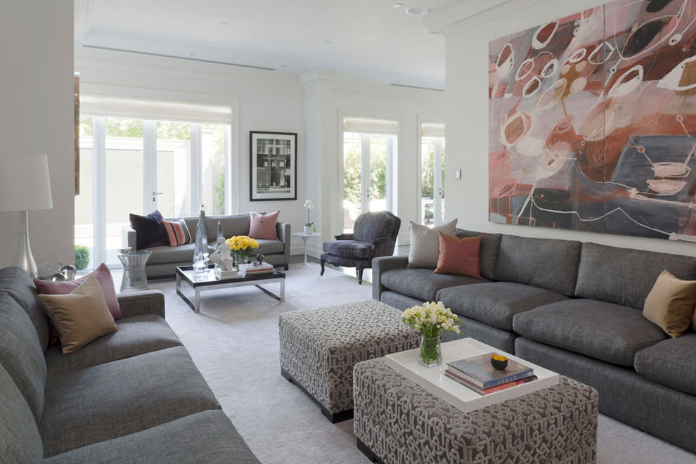 Photo of an expansive contemporary formal open concept living room in Melbourne with white walls, carpet, a standard fireplace, a plaster fireplace surround, a concealed tv and pink floor.